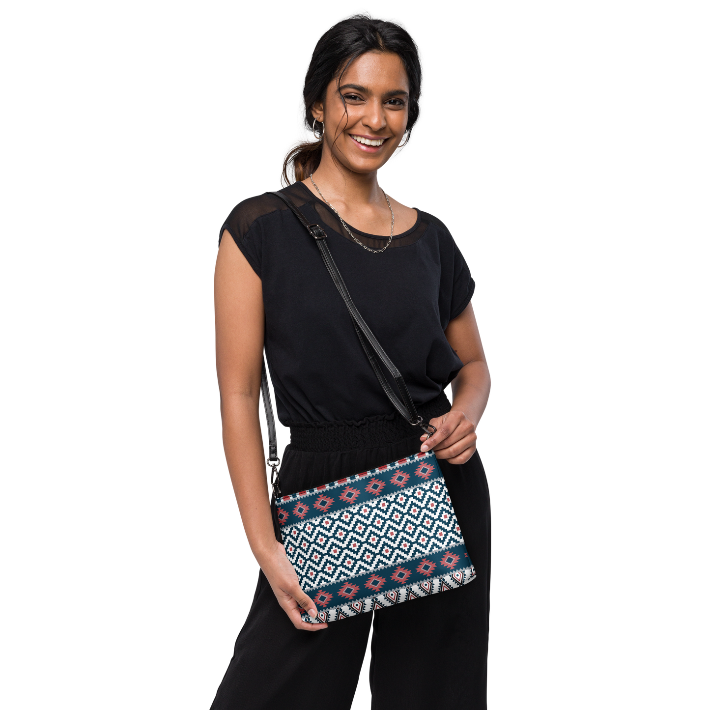Crossbody bag with deep blue and soft red geometric line pattern.
