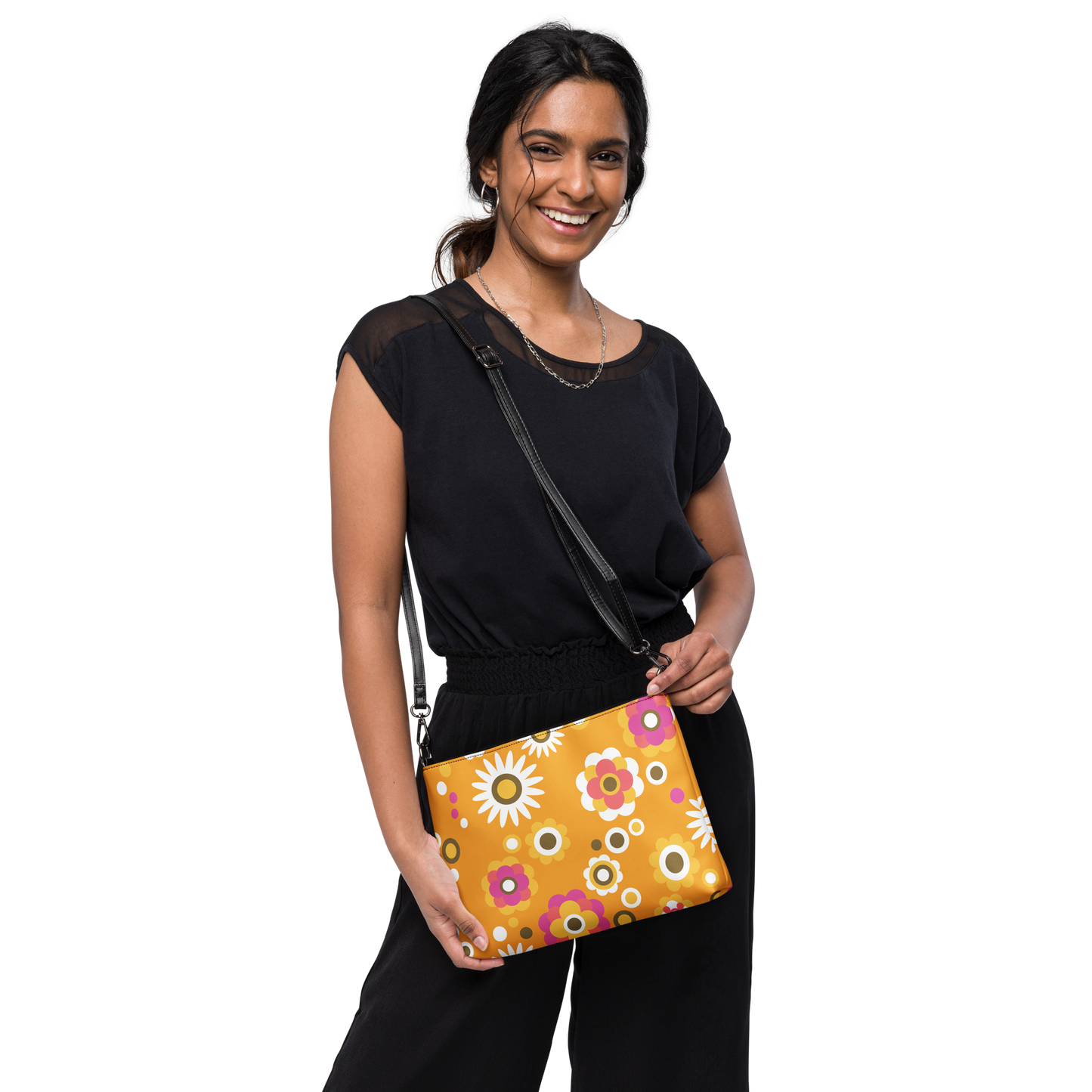 Orange crossbody bag with pink, white, and yellow vintage floral pattern.