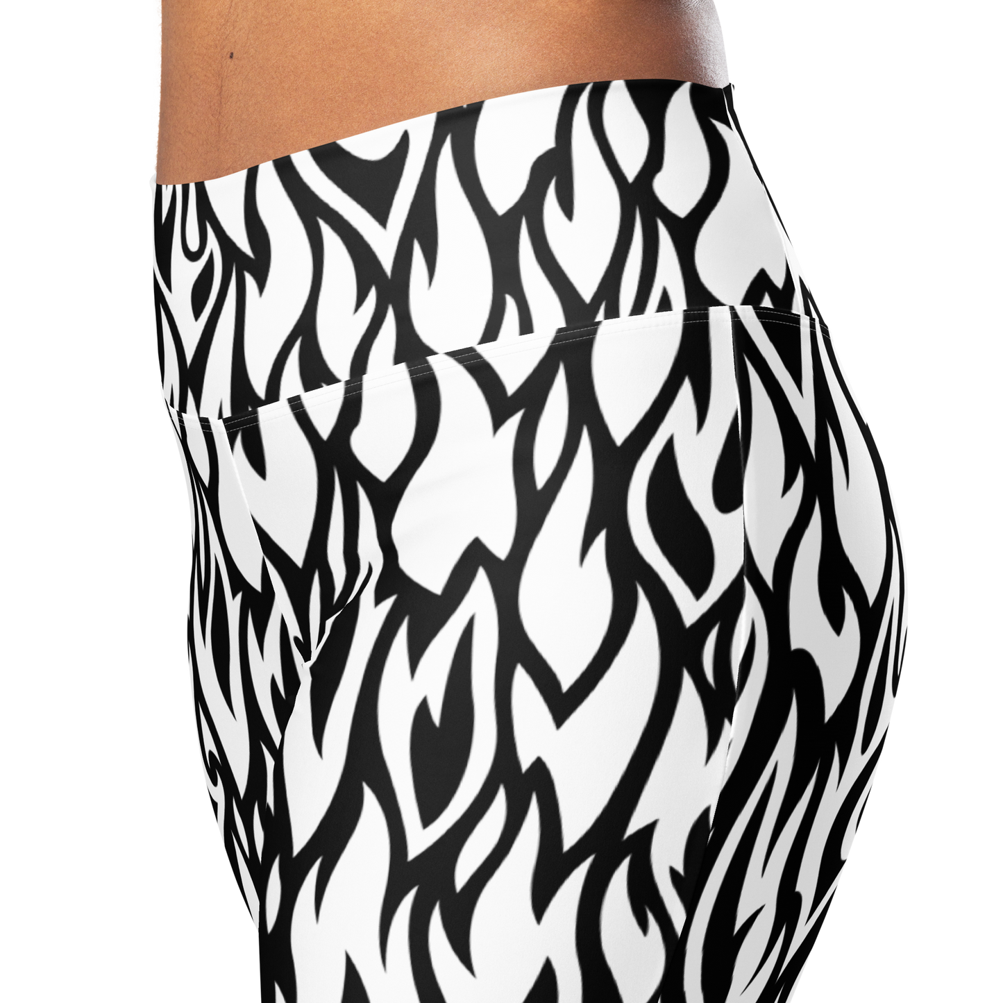 Black and white abstract swirl pattern flare leggings with high waist design.