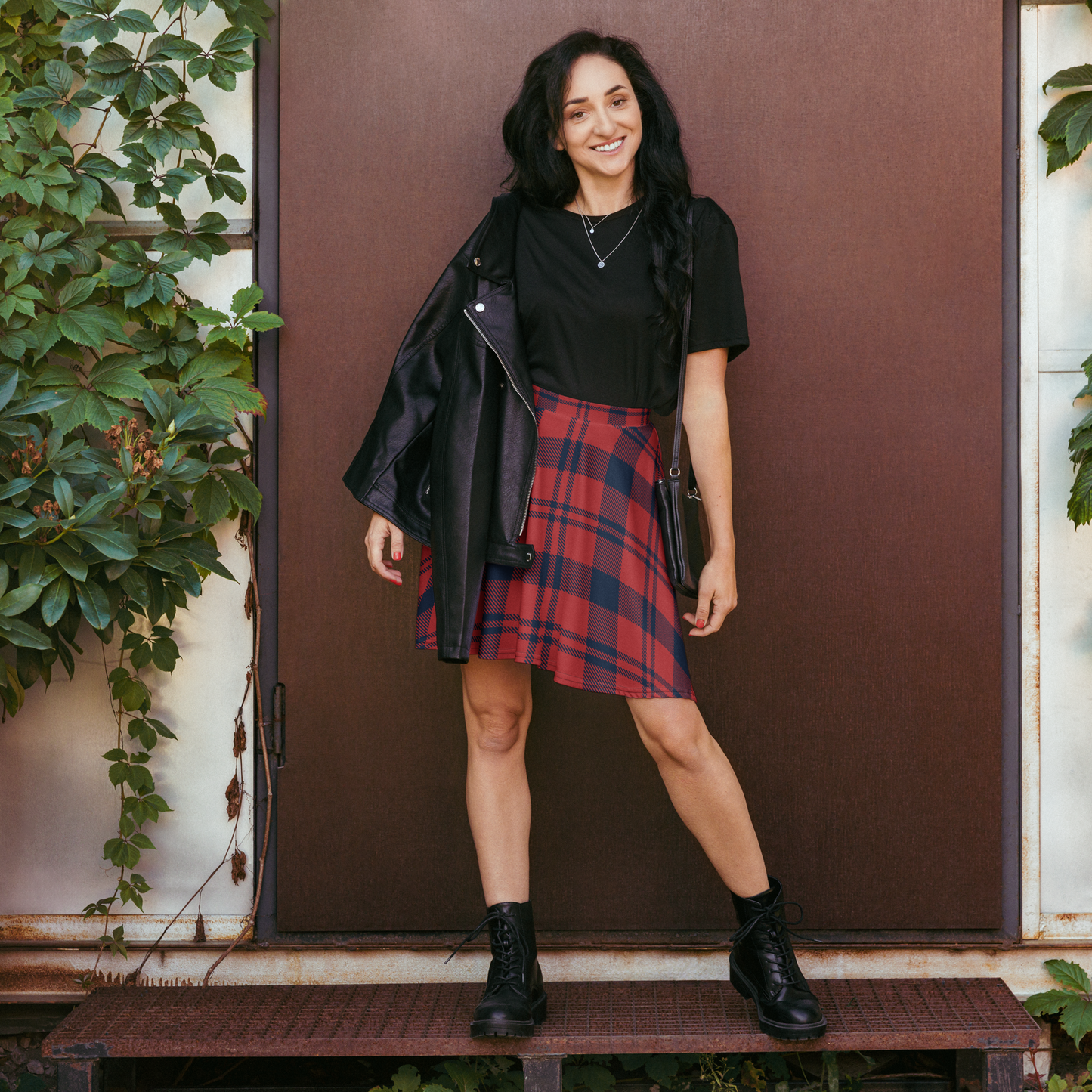 Red and navy checkered skater skirt with flared, mid-thigh silhouette.