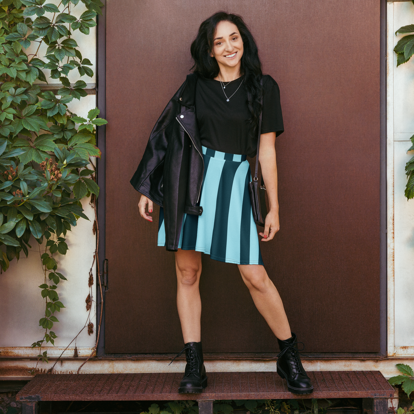 Skater skirt with bold deep blue and light blue sweeping lines pattern.