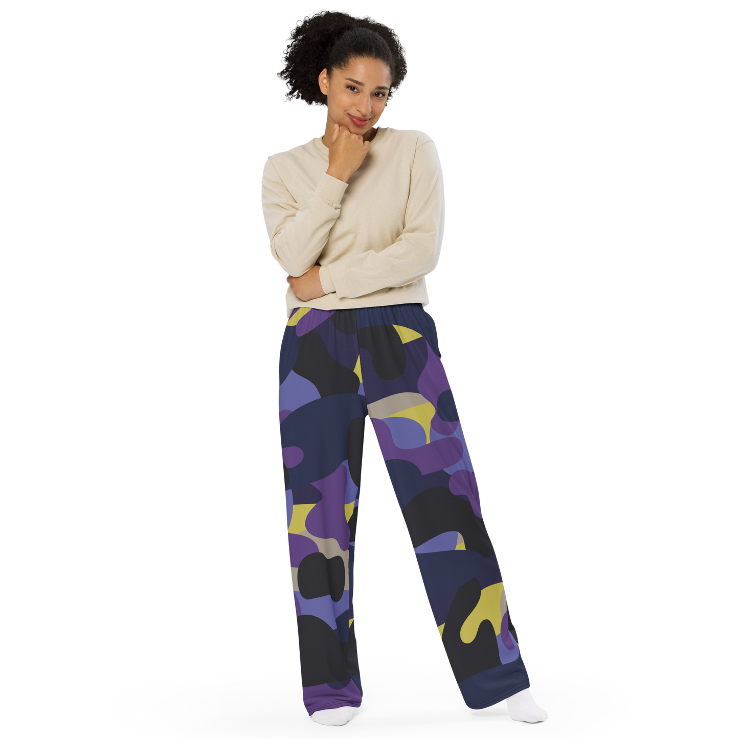 Wide-leg pants with deep blue, purple, yellow abstract camo pattern.