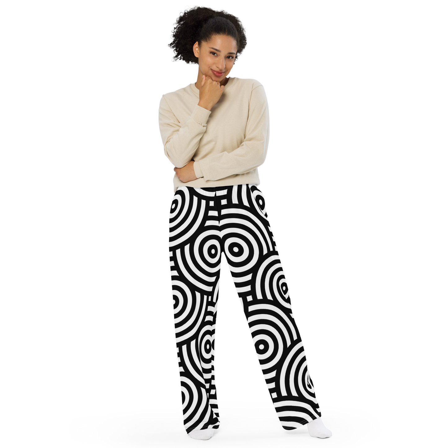 Wide-leg pants with black and white concentric circles pattern.