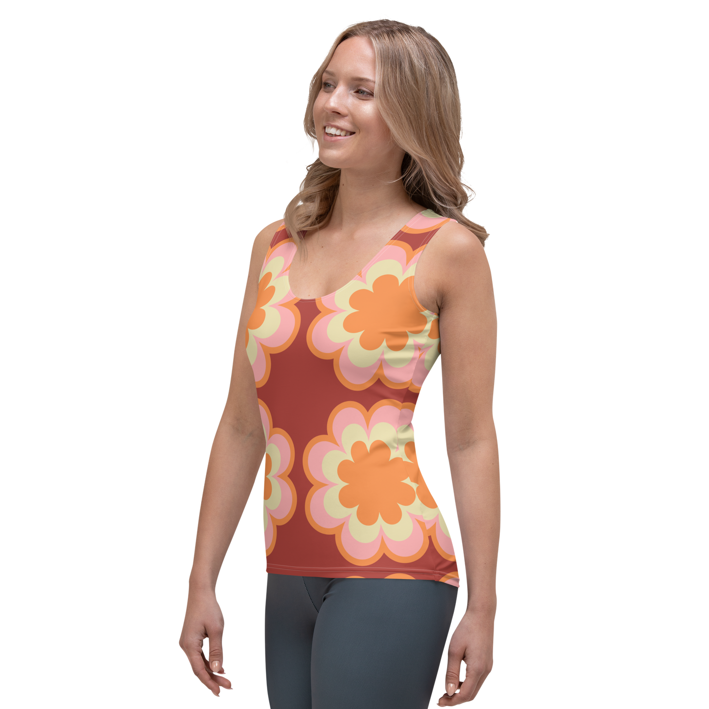 Tank top with oversized orange and yellow florals on sun-washed background.