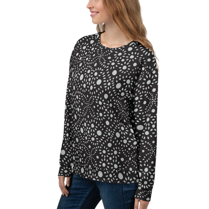 Black sweatshirt with white symmetrical dot pattern throughout the fabric.